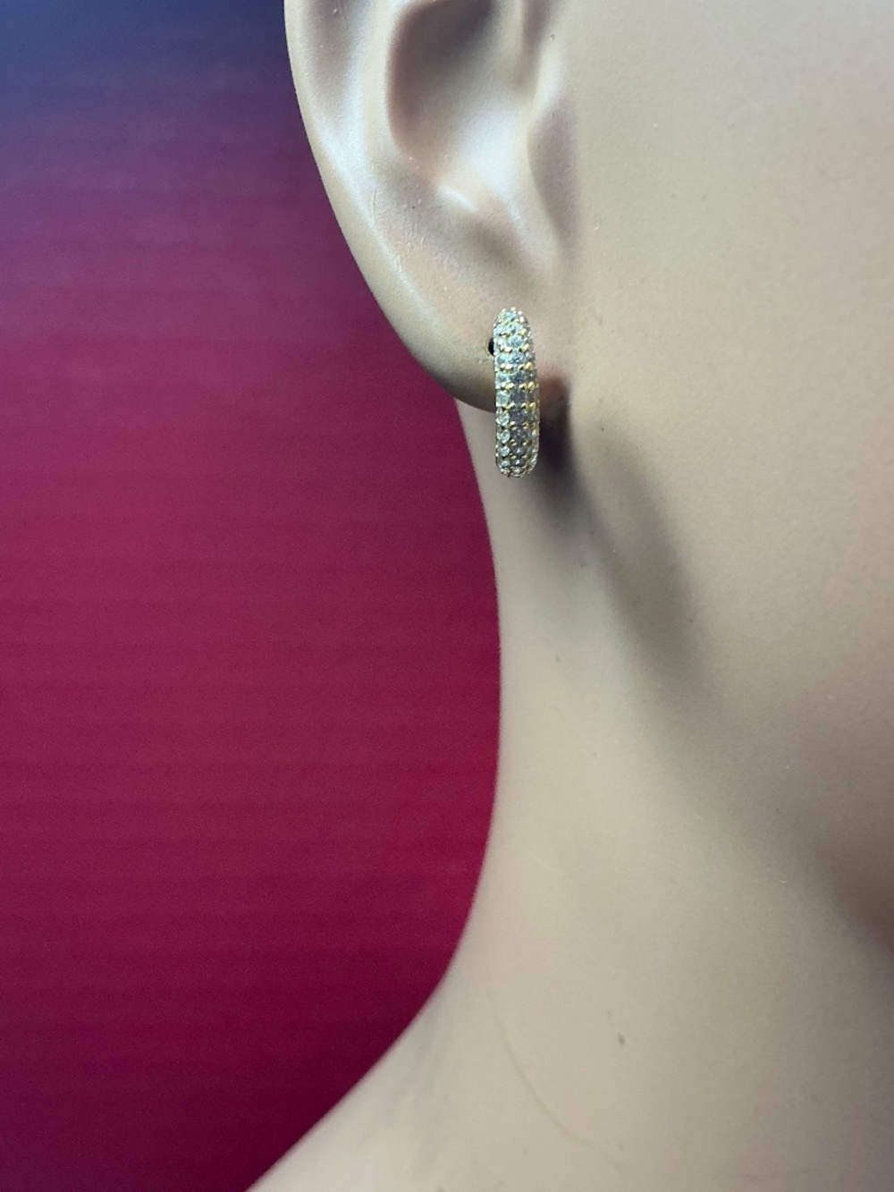 Sterling Silver Gold Plated Hoop Earrings with clear stones. 1/2” diameter